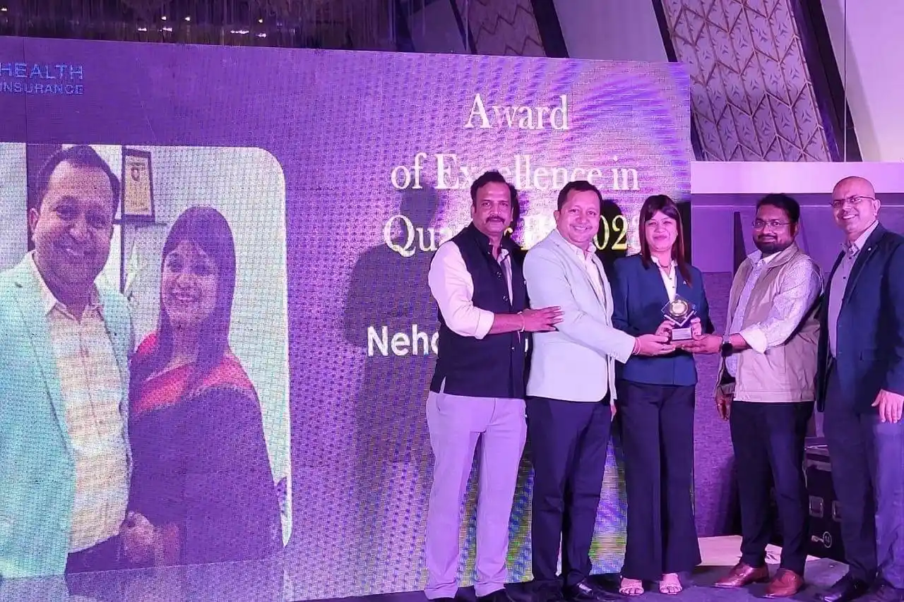 Happy Indian family protected by comprehensive health and life insurance coverage from Sampurn Insurance